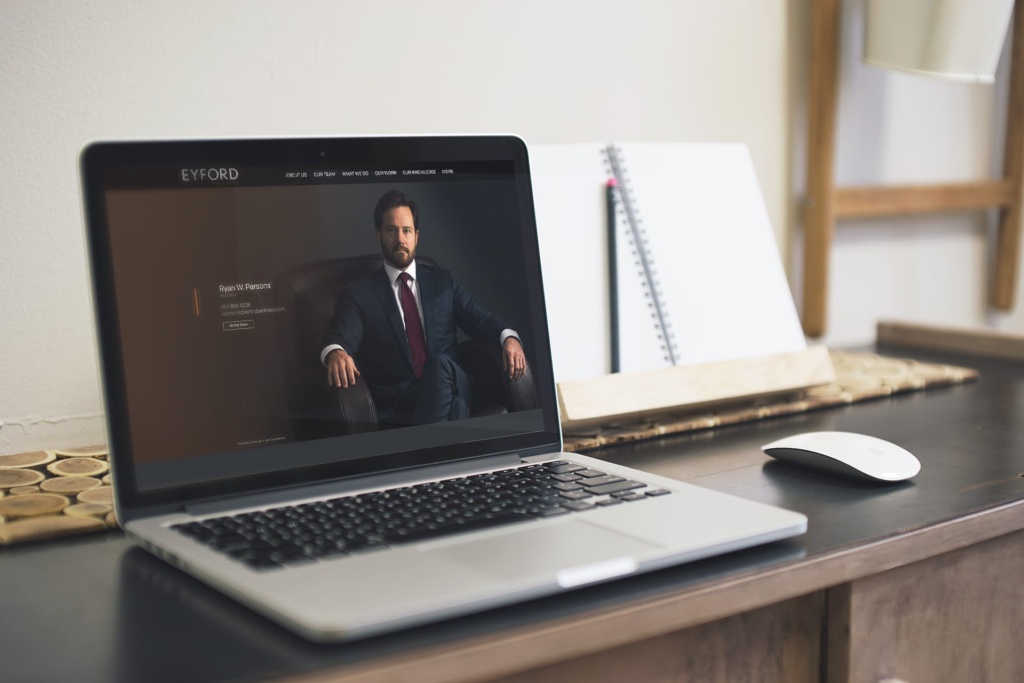Eyford Partners law firm lawyer bio page shown on laptop