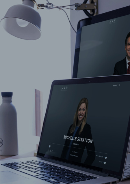 Lawyer bio photos which can be viewed from a laptop and a desktop.