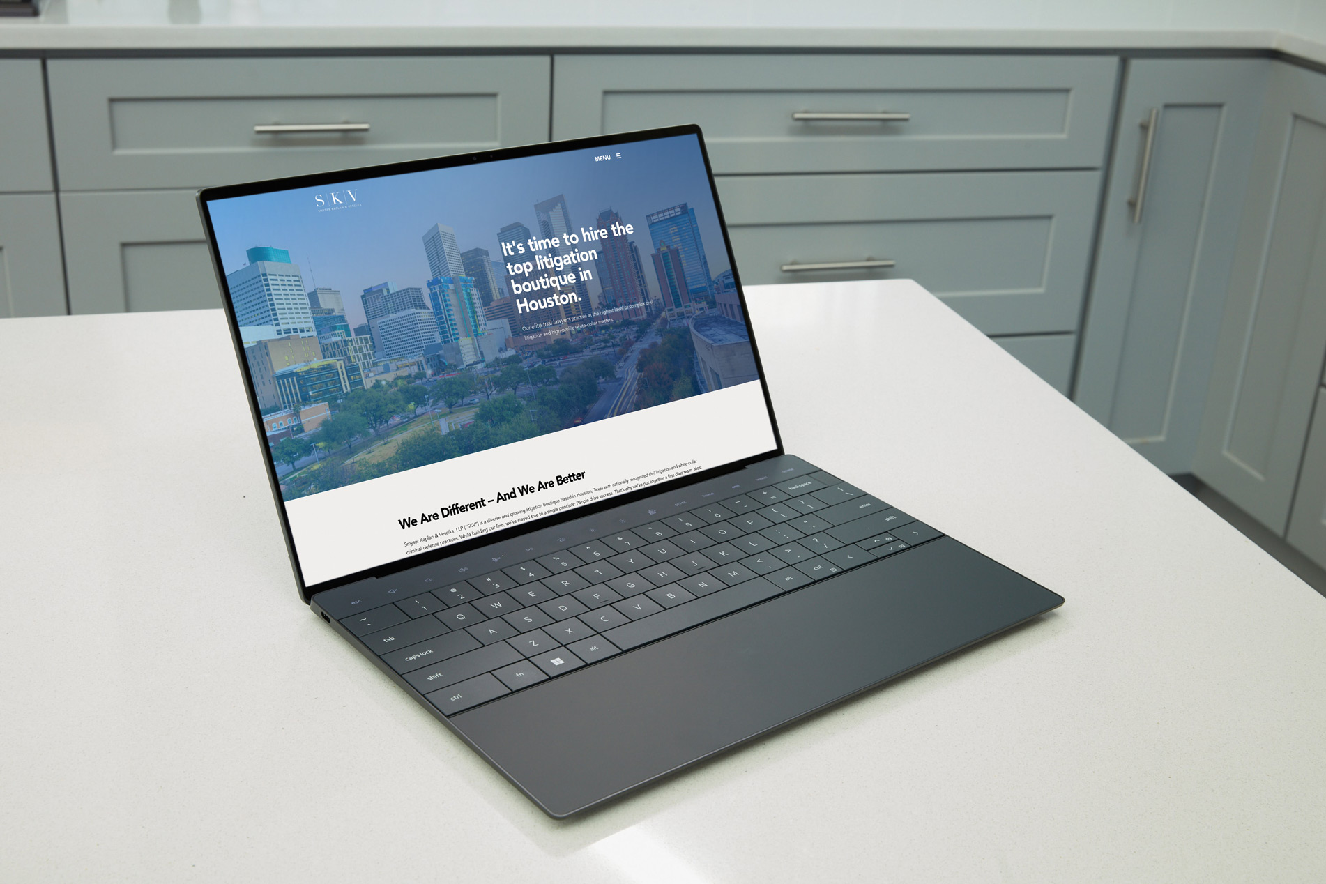 SKV law firm website shown on laptop